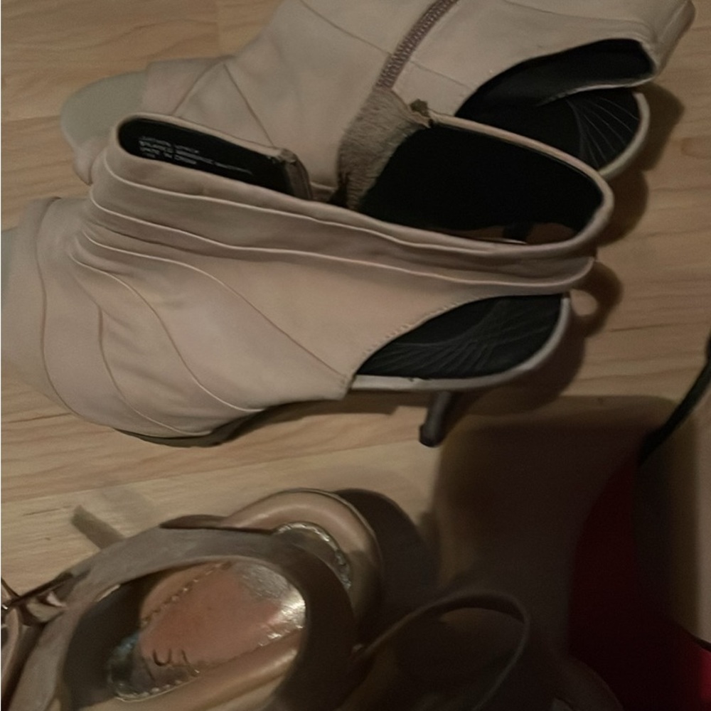 Cream Heeled Boots with a stylish design and substantial sole